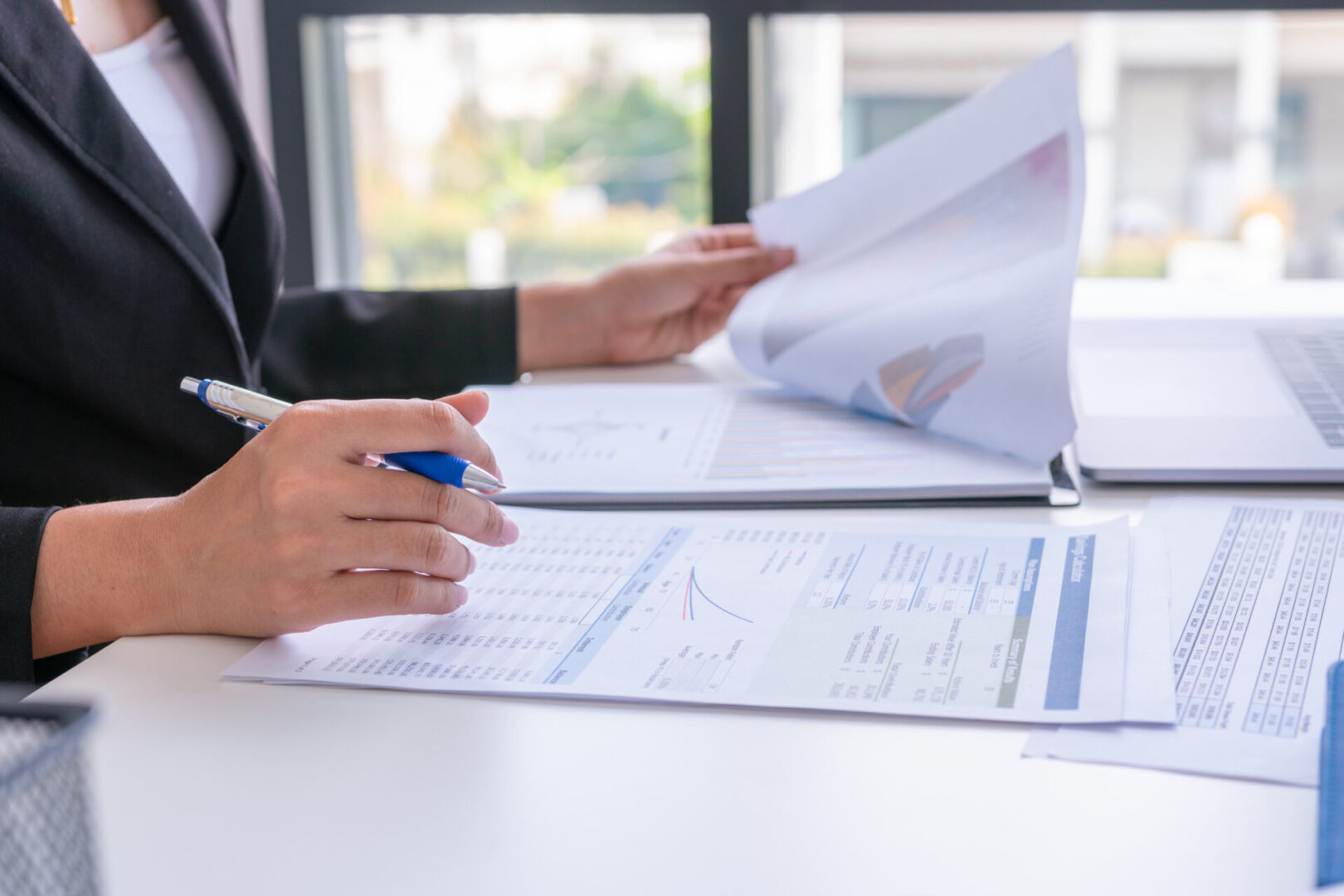 Businessman analysis comparing financial reports. Financial reports are set of documents prepared by an administrative team and ceo recheck report profit. Concept business finance